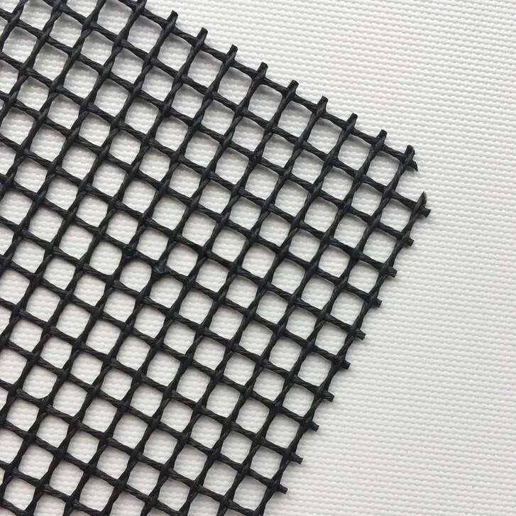 Open PTFE fiberglass mesh showing non-stick coated yarns