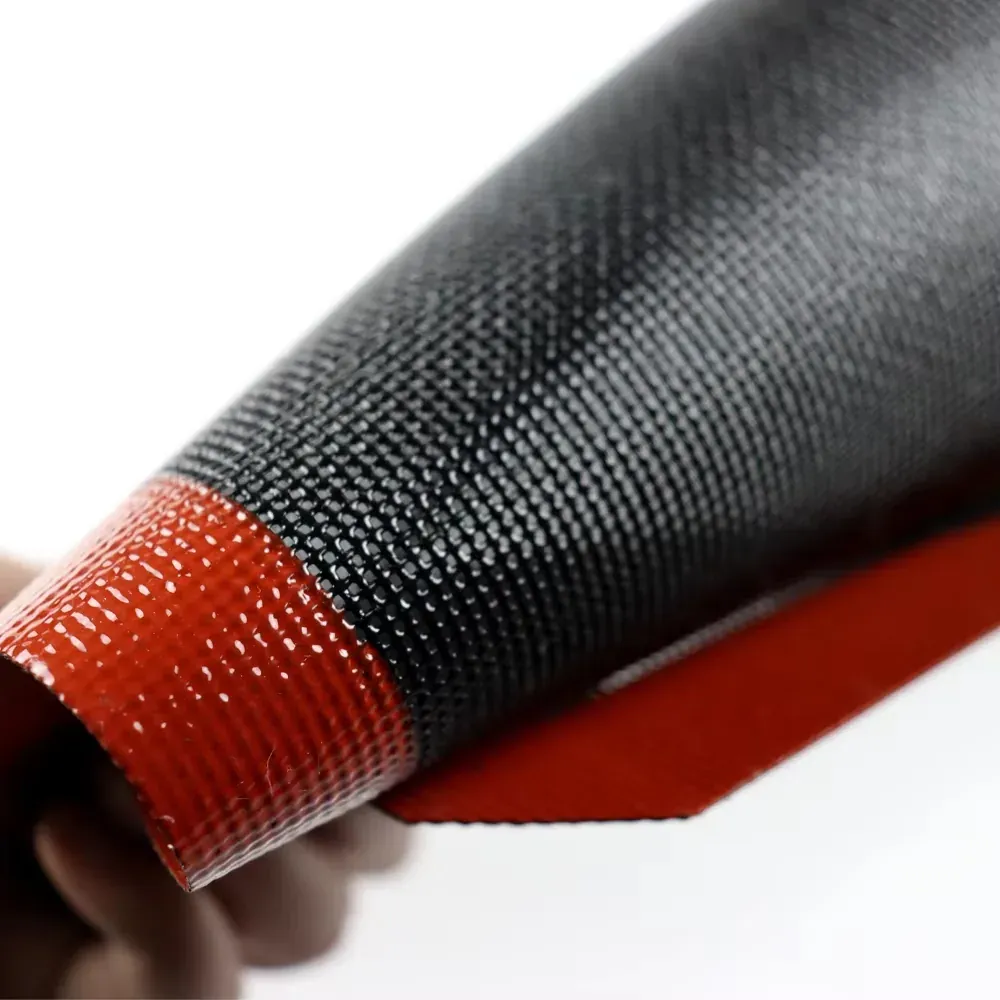 Close-up of a black silicone mesh baking mat with a red border