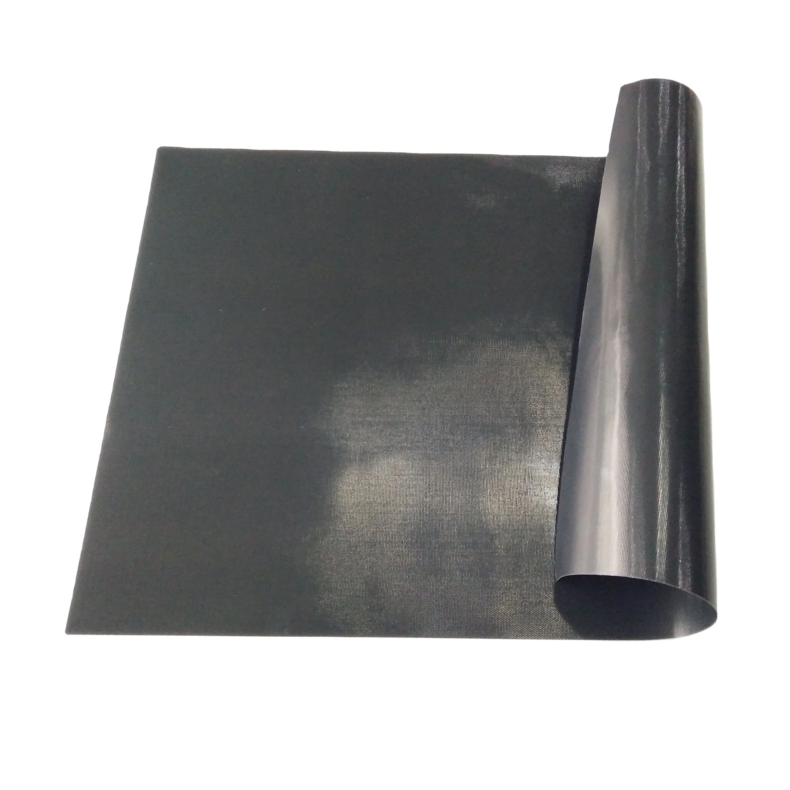 Non stick PTFE grill mat with one side rolled on clean background