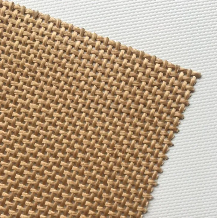 Brown PTFE-coated fiberglass mesh conveyor belt close-up