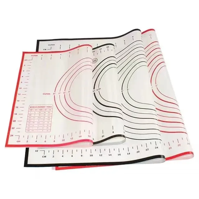 Red and black printed pastry mats shown flat and rolled for storage